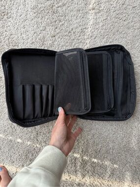 Black Travel Makeup and/or jewelry pouch by Bobbi Brown. Like new.